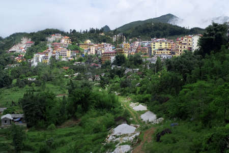 SAPA, VIETNAM - JULY 6: Cluster of buildings in Sapa on July 6, 2009 in Vietnam. Centre of Sapa provides hotels, shoping centers, bars and restaurants for both domestic and international touristsのeditorial素材