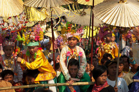 MAE HONG SORN, THAILAND - APR 6   Unidentified boys dressed in ornate costumes and heavy make-up in a Buddhist novice ordination ceremony on Apr 6, 2008 in Mae Hong Sorn, Thailand  The festival, associated with the Tai Yai or Shan people is known for its のeditorial素材