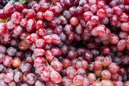 Piles of grapes for sale at a market