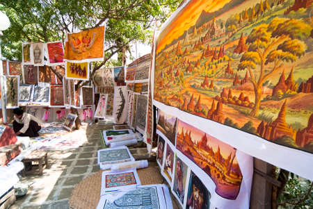 BAGAN, MYANMAR - FEBRUARY 15  Sand paintings for sale outside a temple on February 15, 2011 in Bagan, Myanmar  Sand paintings are popular in Bagan because they are made using sand-covered cloth as a medium rather than ordinary canvasのeditorial素材