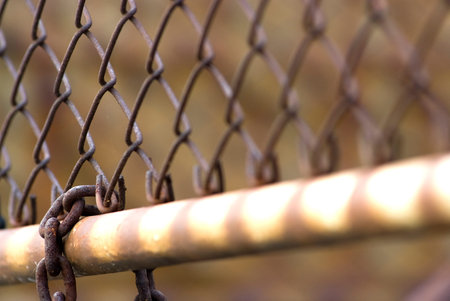 Rusty fence and chainの写真素材