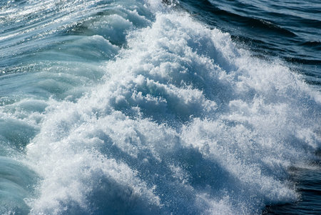 Strong white foam of sea waves