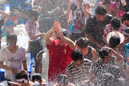 BANGKOK, THAILAND - APR 15:  Revelers during Songkran Festival on Apr 15, 2012 in Bangkok, Thailand....