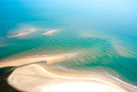 Tropical beach with turquoise water and golden sand in Thailandの写真素材