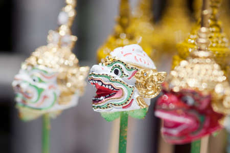 Thai handicraft being painted for sale as souvenirの写真素材