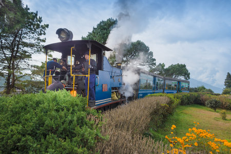 DARJEELING, INDIA – NOVEMBER 27, 2016: steam engine hauled DHR Toy Train has been operating on...