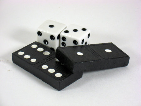 arrangement of dominoes and dice