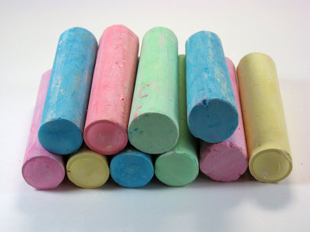 several sticks of brightly colored thick pavement chalk の写真素材