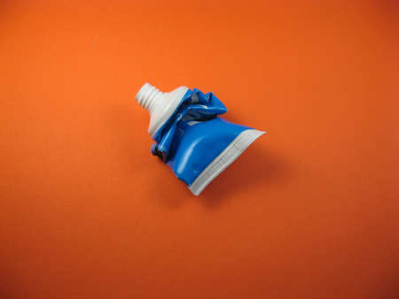 empty blue and white tube as used for creams, toothpaste etc.の写真素材