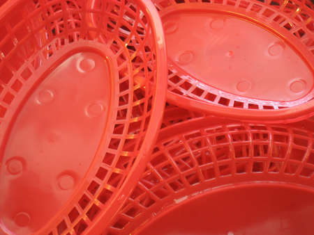 vivid red plastic food basket の写真素材