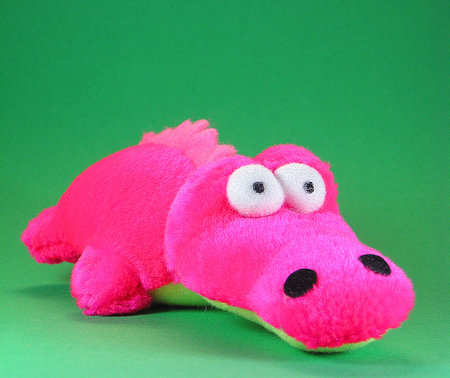 shocking pink small soft toy friendly crocodileの写真素材