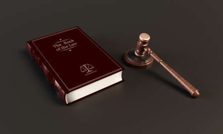 Lying book and a wooden gavel of judges on the table. Close Up. 3d renderingの写真素材