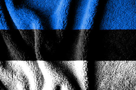 Towel fabric pattern flag of Estonia. The texture of the wrinkled surface of the fabric. Close-up view.の写真素材