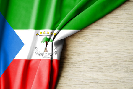 Equatorial Guinea flag. Fabric pattern flag of Equatorial Guinea. 3d illustration. with back space for text. Close-up view.の写真素材