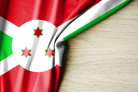 Burundi flag. Fabric pattern flag of Burundi. 3d illustration. with back space for text. Close-up view.の写真素材