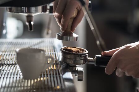 Barista making coffee, espresso cup and coffee machine.の写真素材