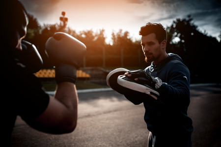 boxing outdoor workout with trainer;;の写真素材