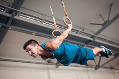 sportsman has workout in oldschool gym;の写真素材