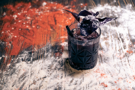 colored drink with decor on brick backgroundの写真素材