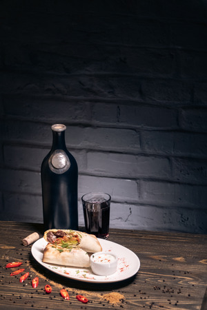 tasty food on wood and with alcoholの写真素材