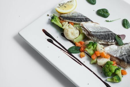 healthy sea food with lemon, basil, cauliflower and carrotsの写真素材