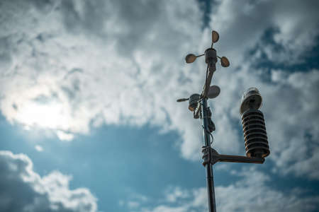 modern anemometer or weather wind vane for measuring meteorology conditionsの写真素材