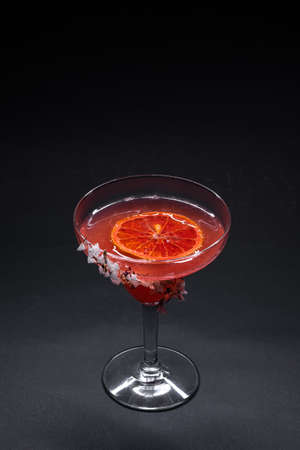 hemingway daiquiri cocktail drink with grapefruit in glass on black backgroundの写真素材