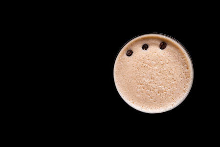 top view of espresso martini cocktail or coffee drink on black backgroundの写真素材
