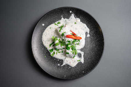 traditional georgian food gebjalia with matsoni cheese and red chili pepper