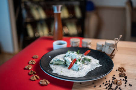 traditional georgian food gebjalia with matsoni cheese and red chili pepperの写真素材