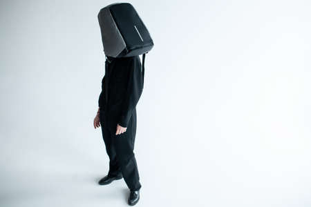 modern student with bag studio shotの写真素材