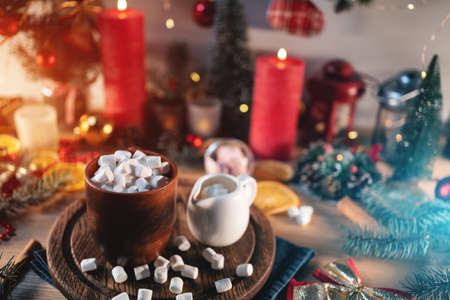 hot tasty cocoa cup with marshmallow on wooden table at christmas holidayの写真素材