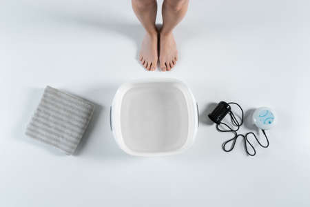 procedure of ionic detox foot bath machine in spa beauty center isolatedの写真素材