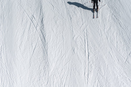ski at winter mountains on track on snowy resortの写真素材