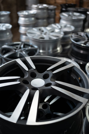 closeup of car alloy wheel in tire storeの写真素材