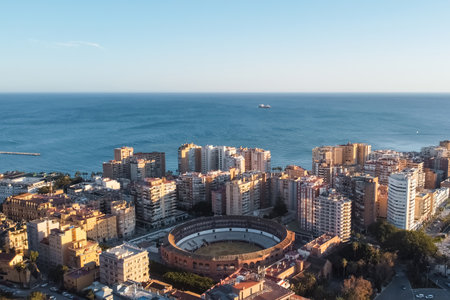 Malaga bullfight Arena and residential district, downtown, aerial viewの写真素材