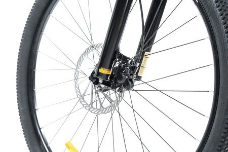 bicycle front wheel with spoke isolated on white backgroundの写真素材