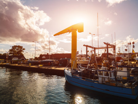 small port with ships and loading crane, Jastarnia, Hel peninsula, Polandの写真素材