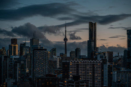 sunset over Toronto city downtown skyline, sunrise over CN Tower and skyscrapers of financial...