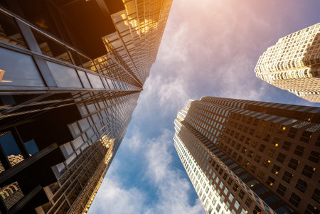 tall skyscrapers buildings looking up perspective, modern architecture of steel and glass, skyline of big cityの写真素材