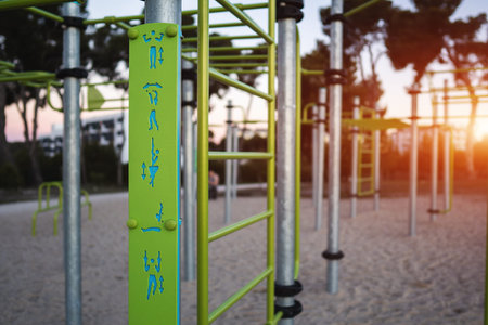 street fitness park for workout and calisthenics area, sport equipment with bars for push and pull...