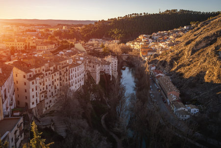 aerial view of historical district of Cuenca town, river and mountains landscape