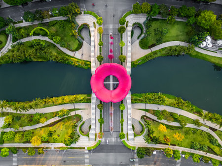 green urban tropical park with creative flower sculpture, Sala district, Ho Chi Minh city, aerial drone viewの写真素材