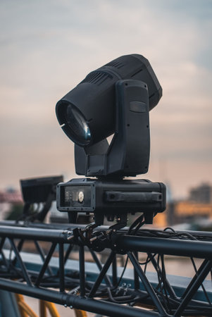 spotlights and projector lamps illuminating cable-stayed bridge at night, professional lighting...