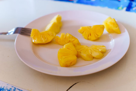 pineapple on dishの写真素材