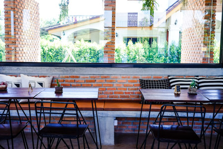 wood table in modern coffee shopの写真素材