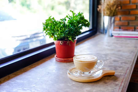 hot coffee with late art on barの写真素材