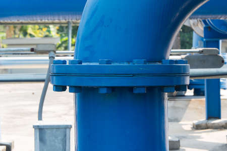 Steel pipe with joins and flanges with boltsの写真素材