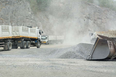 Lorry in quarry plant  with very dustyの写真素材