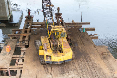 Old mobile crane in constructionの写真素材